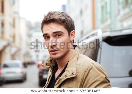 Stockfoto: Young Man Goes With Camera