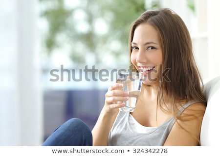 Stockfoto: Thirsty Woman Drinking Glass Of Water