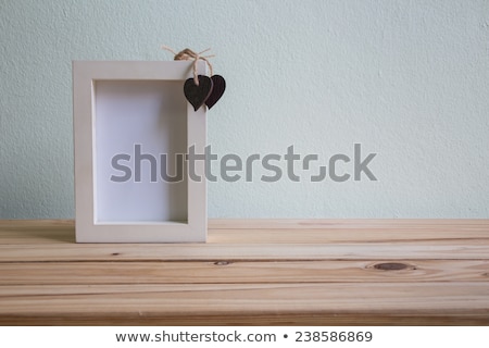 [[stock_photo]]: Photo Frames Over Colorful Wooden Walls