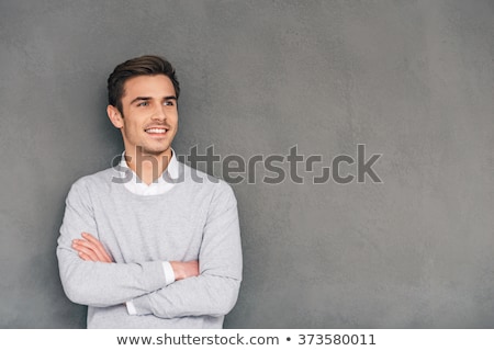 Сток-фото: Young Casual Man Looking Pensive