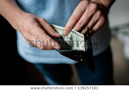 Foto stock: Businessman Gets Money From The Wallet Isolated On A White Background