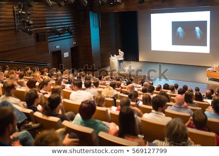Stock foto: Speaker Giving Public Presentation In Conference Hall