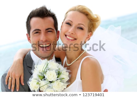 Сток-фото: Young Wedding Couple Standing Outdoors