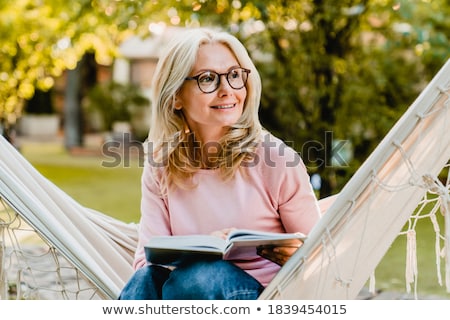 Stockfoto: Portrait Of Blonde Woman Wearing Glasses