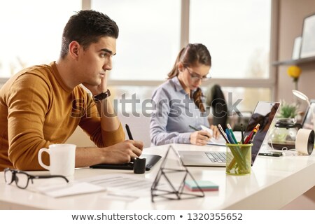 Stock photo: Alm On Laptop In Modern Workplace Background