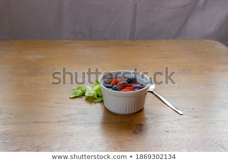 Stock photo: Fresh Raw Organic Blueberries With Leaf On Wooden Spoon On White Background Food Concept