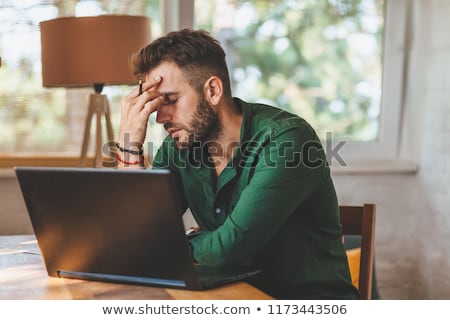 [[stock_photo]]: Tired Man At The Computer