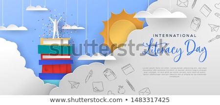 Stock photo: Literacy Day Banner Man In Papercut Book Mountain