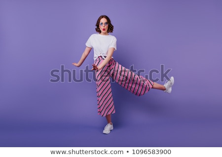 Stock photo: Full Length Portrait Of A Beautiful Young Short Haired Woman