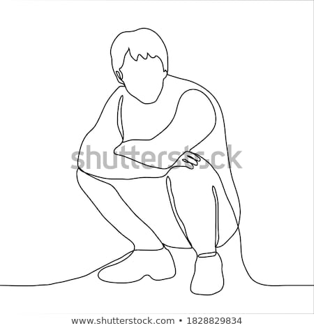 Stok fotoğraf: Young Man Sits On Ones Hunkers