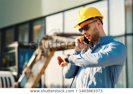 Stockfoto: Engineer Looking At The Time