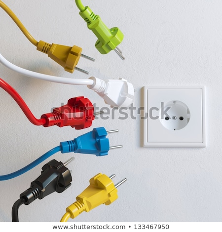 Сток-фото: Plugging In Electrical Power Supply Into Wall Outlet