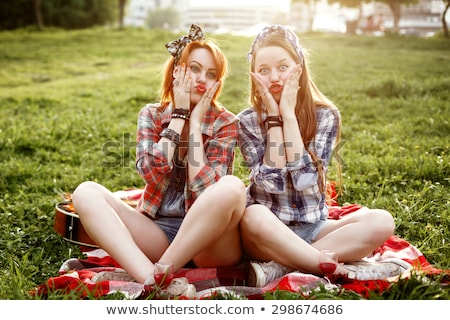 Stock fotó: Hipster Girls Dressed In Pin Up Style Having Fun