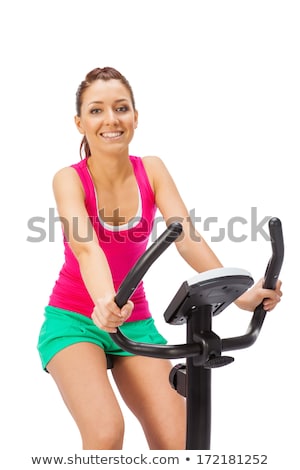 ストックフォト: Bodybuilder Riding A Stationary Bicycle