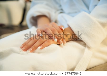 Foto d'archivio: Gentle Bride In A Dressing Gown Waiting For Meet