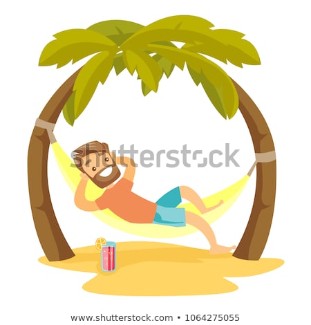 [[stock_photo]]: Man Lying On Hammock At Beach