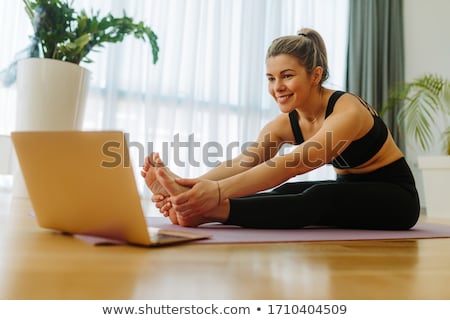 Stok fotoğraf: Beautiful Woman Is Making Exercises