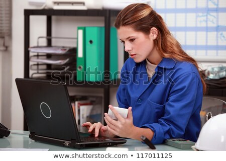 ストックフォト: Craftswoman Working In The Office Of Her Company