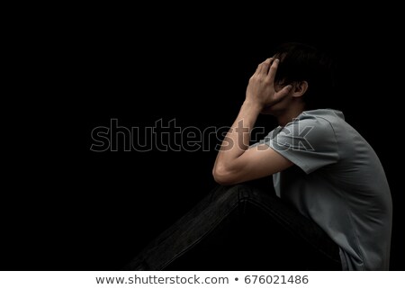 Stock photo: Unhappy Man With Head In Hands Sitting On Floor