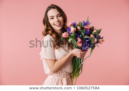 Stok fotoğraf: Beautiful Young Girl With Tulips