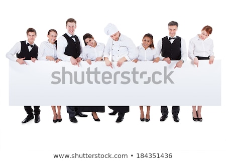 Сток-фото: Female Waitress Pointing At Placard