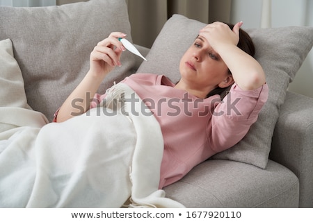 Stok fotoğraf: Upset Woman Lying On Bed