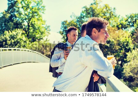 Foto stock: Portrait Of A Thoughtful Businessman Outdoors