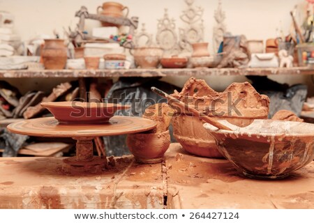 Stockfoto: Earthen Jar Making By Hands Of Woman Potter In Workshop