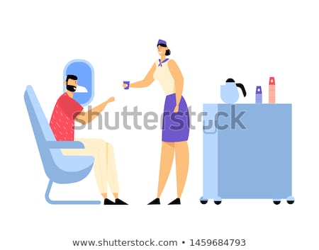 Foto stock: An Air Hostess With A Trolley