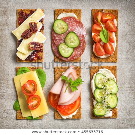 Foto d'archivio: Rye Whole Grain Bread On A Grey Stone Background