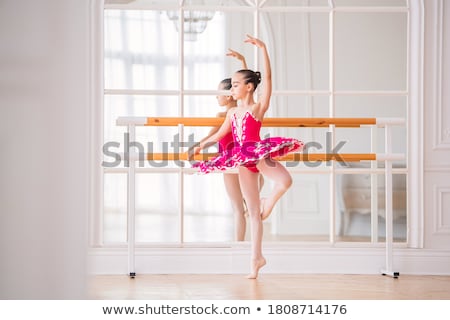 Foto stock: Ballerina Posing In Dance Hall