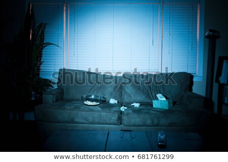 Stock fotó: Empty Sofa With Box Of Tissues And Popcorn