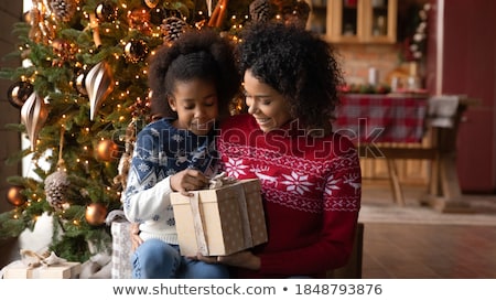 Foto stock: Merry Christmas Children Unpacking Holidays Gifts