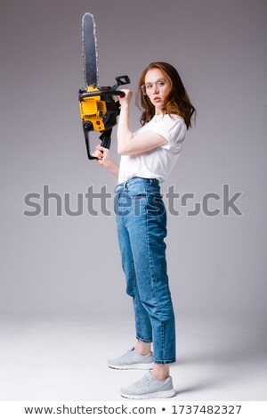 ストックフォト: Mad Woman With Chainsaw