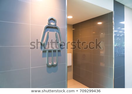 [[stock_photo]]: Toilet Sign And Direction On Wood Wall