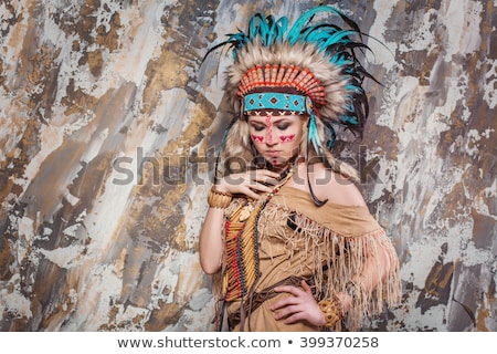 Zdjęcia stock: Young Woman In Costume Of American Indian
