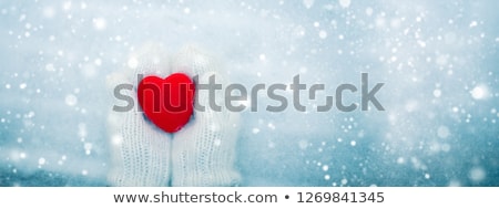 Stok fotoğraf: Girl In Winter Clothes Giving Heart Concept Of Valentines Day