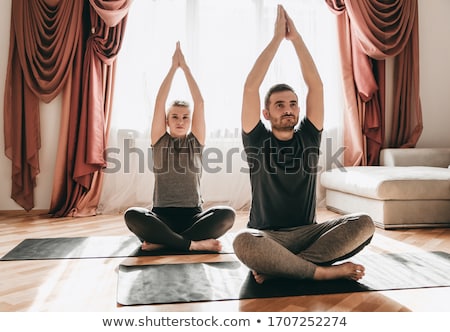 Foto stock: Couple Doing Yoga