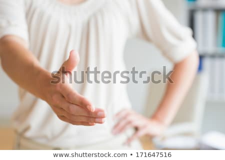 Foto stock: Young Woman Offering Hand For Handshake