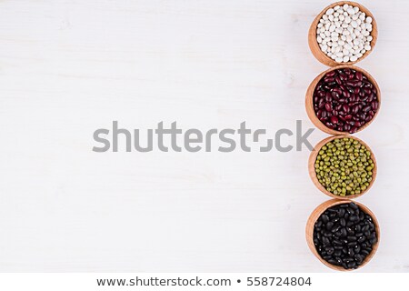 [[stock_photo]]: Border Of Assortment Kidney Beans In A Wooden Bowls Macro With Copy Space On White Wood Background