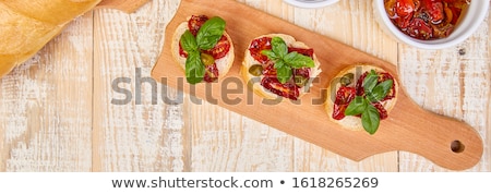 Foto stock: Bruschetta Or Crostini With Sun Dried Tomatoes And Capers