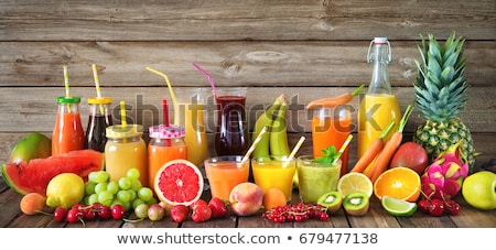 Stok fotoğraf: Bottle With Carrot Juice Fruits And Vegetables