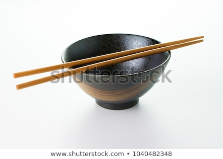 Chopsticks And Bowl Imagine de stoc © Kenishirotie