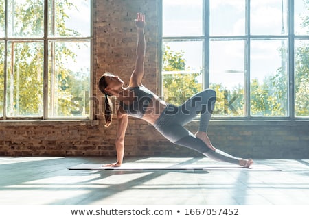 Stock photo: Young Sporty Fit Woman Doing Hatha Yoga Asana