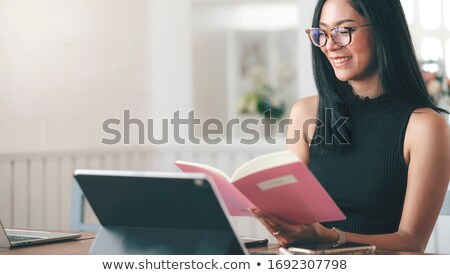 Zdjęcia stock: Beautiful Young Business Woman Wearing Glasses Sitting Relaxed A