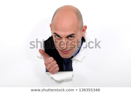 [[stock_photo]]: Bald Man Bursting Through Poster Giving Thumbs Up