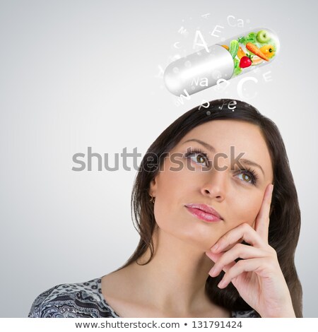 Foto stock: Healthy Life Concept Woman With Vitamins Overhead