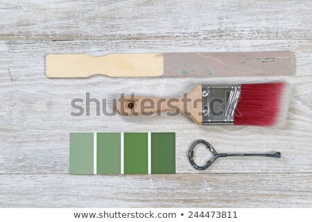 Old Used Green Paintbrush On Rustic Wooden Board ストックフォト © tab62