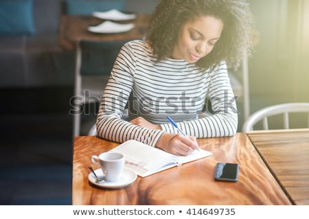 Zdjęcia stock: Woman Drinking Coffee And Writing A Diary Note