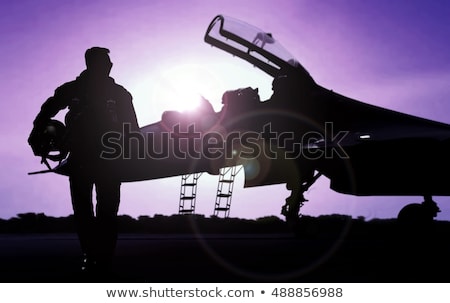 Stockfoto: Military Pilot And Aircraft At Airfield On Mission Standby